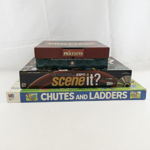 lot 119 image: Set of 3 Board Games - Chutes & Ladders, Priceless, & Sports Trivia