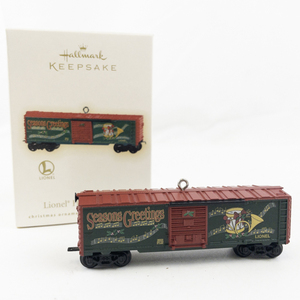 lot 202 image: Lionel Christmas Train Collection Holiday Box Car Ornament