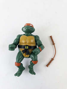 lot 230 image: Playmates Toys TMNT Michelangelo Action Figure