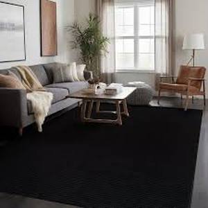 lot 40 image: Beverly Rug Oasis Solid Black 4 ft. x 6 ft. Non-Slip Rubber Back Indoor Area Rug   Customer Returns See Pictures