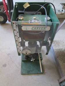 lot 10 image: Carver model 3393 heated hydraulic ...