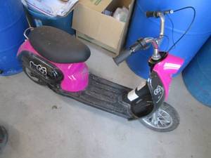 lot 14 image: Hello Kitty mini- motorized scooter...