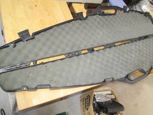 lot 25 image: Gun guard hardside rifle case...