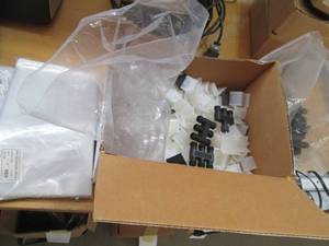 lot 74 image: 712 bags, Uline strap guards and ...