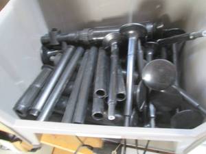 lot 84 image: Stackable organizer containing wate...
