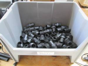 lot 86 image: Stackable organizer containing wate...