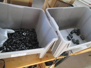 lot 89 image: (2) Stackable organizers containing...