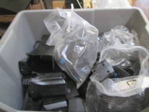 lot 103 image: Stackable organizer containing wate...