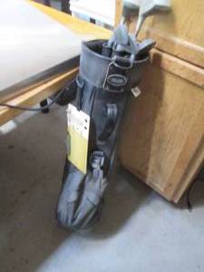 lot 131 image: Golf bag containing misc golf clubs...