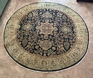 lot 119 image: Elegant Round Area Rug