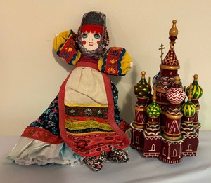 lot 120 image: Russian Doll and Temple Figurine