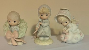 lot 151 image: Precious Moments Figurines including Sending You My Love, Surrounded with Joy and March