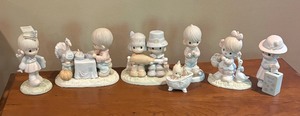 lot 195 image: Precious Moments Figurines including Brotherly Love, Waddle I do without You, September and More