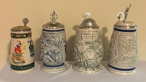 lot 196 image: Centennial Olympic Games, Millennium, Tribute to Rescue Workers and America the Beautiful Steins
