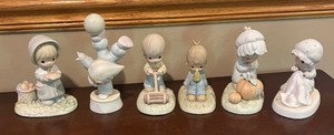 lot 197 image: Precious Moments Figurines including Love is Kind, October, Love Covers All and More