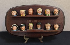 lot 85 image: Miniature Royal Doulton Character Mugs Set