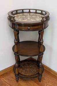 lot 24 image: Elegant Tiered Round Accent Table