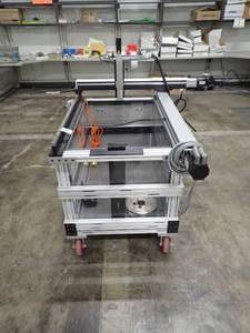 lot 55 image: The item shown below is a acrylic water tank and linear actuators (with motor control boards in the enclosure)  Tank is equipped with 3 Danaher Servo Motors (see photos)