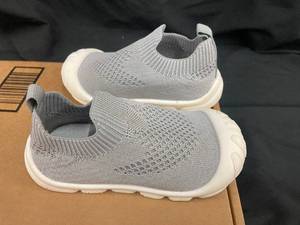 lot 4 image: Pair of Baby Knit Slip-On Shoes, Size 27