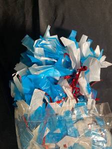 lot 143 image: Bag of Blue and White Pom Pom Shredded Tissue