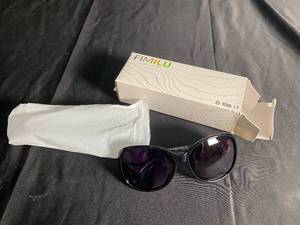 lot 148 image: FIMILU UV Protection Sunglasses with Gold Bow Accent