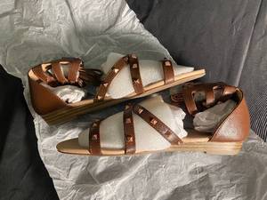 lot 149 image: Pair of Brown Studded Leather Sandals