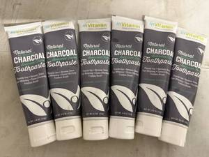 lot 31 image: 6 Bottles of Natural Activated Charcoal Toothpaste
