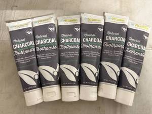 lot 33 image: 6 Bottles of Natural Activated Charcoal Toothpaste