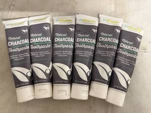 lot 35 image: 6 Bottles of Natural Activated Charcoal Toothpaste