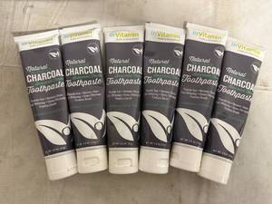 lot 36 image: 6 Bottles of Natural Activated Charcoal Toothpaste