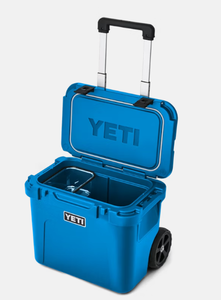 lot 3 image: YETI Roadie 32 Wheeled Cooler Big Wave Blue