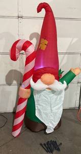 lot 330 image: Airblown Inflatables Christmas 6.5 Foot Gnome with Candy Cane