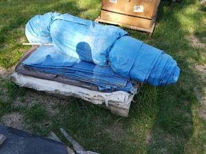 lot 23 image: pallet of tarps