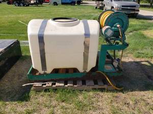 lot 29 image: Lesco 200 gallon spray tank with hose reel and skid