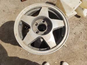 lot 56 image: 4 15 inch rims - Chevy bolt pattern