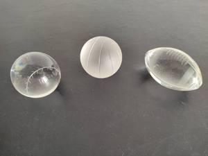 lot 7 image: Sports Themed Glass Paperweights