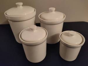 lot 21 image: Four Piece Canister Set