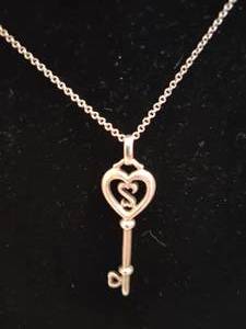 lot 104 image: Silver Key Pendant & Chain Stamped 925