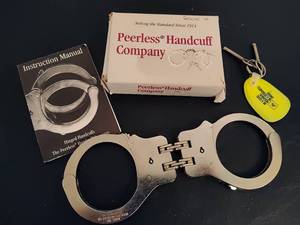 lot 78 image: Peerless Handcuffs wKeys