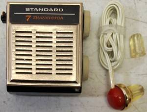 lot 46 image: Vintage Standard 7 Transistor Radio with Ear Buds (View Photos)