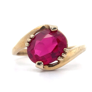 lot 48B image: Oval Ruby Solitaire Bypass Ring in Yellow Gold VIDEO