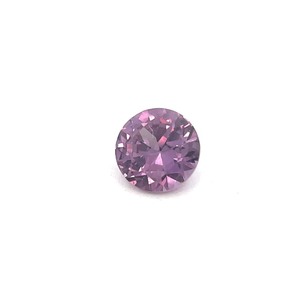 lot 82B image: 0.73 Carat Color Change Sapphire  Violet Blue to Reddish-Pink  VIDEO 