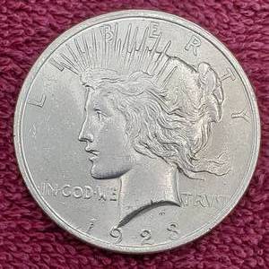 lot 87 image: 1923 Peace Dollar from Original BU Roll