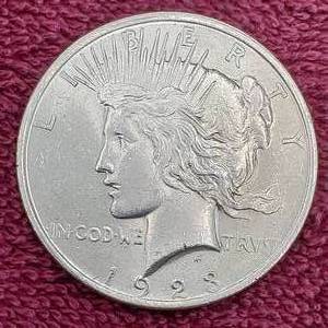 lot 95 image: 1923 Peace Dollar from Original BU Roll
