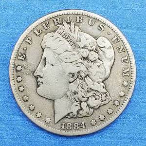 lot 97 image: 1884-S Morgan Silver Dollar