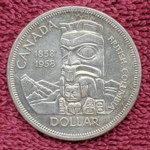 lot 243 image: 1958 Canada Silver Dollar 80% Silver