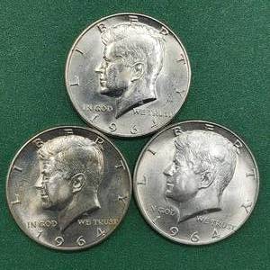 lot 259 image: 3 1964 Kennedy Half Dollars Brilliant White from Unc Roll 90% Silver