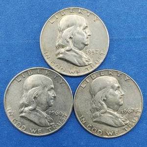 lot 313 image: 3 Franklin Half Dollars 90% Silver