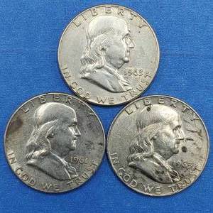 lot 319 image: 3 Franklin Half Dollars 90% Silver