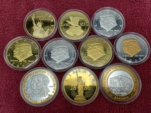 lot 400 image: 10 Large Medal Coins, incl. 4 Donald Trump all in Airtites